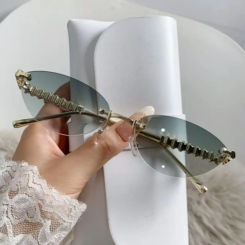 Nieuwe Cat Eye Rivet Randloze  - Designer Sunglasses recensie en prijs