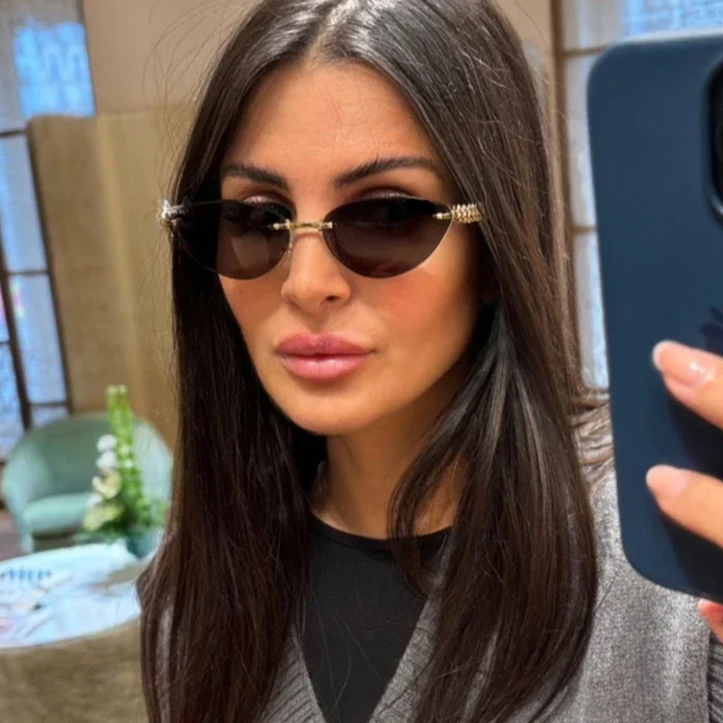 Nieuwe Cat Eye Rivet Randloze  - Designer Sunglasses recensie en prijs