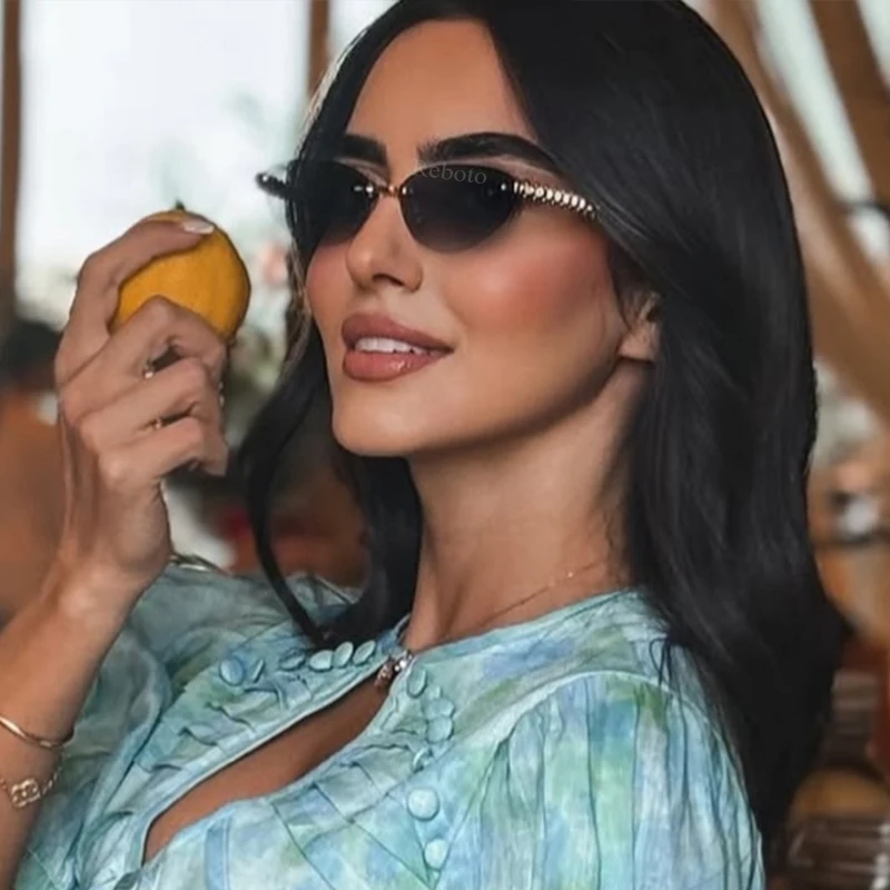 Nieuwe Cat Eye Rivet Randloze  - Designer Sunglasses recensie en prijs